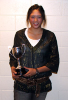 First grade Blue women's captain Tessa King with their trophy